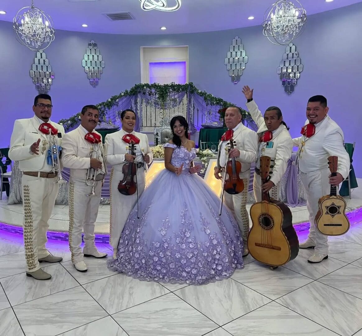 Girl with mariachi band at celebration.