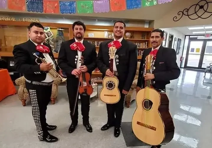 Mariachi band in a library setting.
